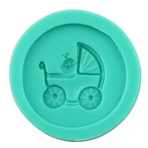Macro detail of green silicone fondant mold featuring a classic baby stroller pattern