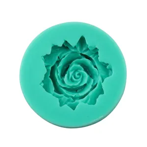 Close-up of a green silicone rose mold for DIY baking and fondant cake decoration
