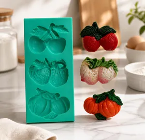 Detailed view of green silicone mold for apple, peach, and pumpkin shaped fondant cake DIY