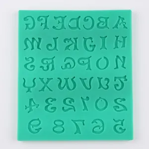 Macro detail of green silicone baking mold featuring alphabet letters and number patterns