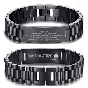 Detailed macro of black matte stainless steel chain bracelet with personalized engraving