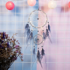 Handmade gray dream catcher with dual rings, feathers, beads and soft LED fairy lights