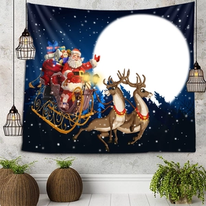 Detailed view of a Christmas tapestry with Santa Claus on a sleigh over a blue snowy night