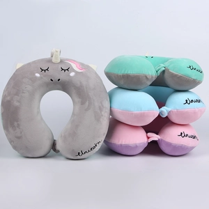 Cartoon unicorn U-shaped memory foam neck pillow for travel and napping in multiple colors