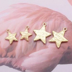 Set of four gold star-shaped alloy pendants featuring i love you engraving on pink feathers
