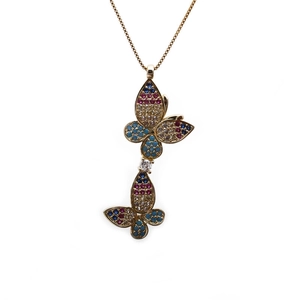 Golden butterfly necklace with colorful micro-paved zircons on a delicate chain
