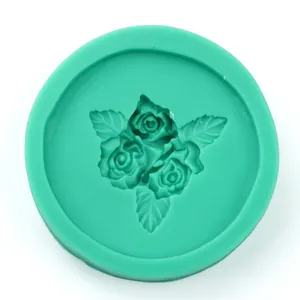 Green silicone fondant mold featuring intricate 3D rose and leaf patterns for DIY baking