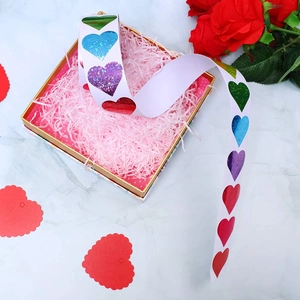 Roll of holographic heart stickers in vibrant colors for Valentine gift decoration