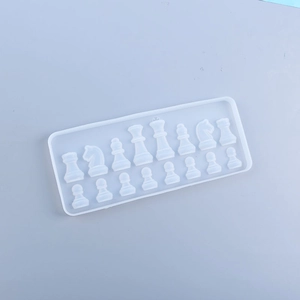 Detailed top view of 16-cavity translucent silicone mold for DIY resin chess pieces