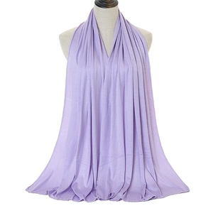 Detail of light purple mercerized cotton headscarf showing elastic fabric and soft texture