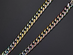 Macro view of colorful iridescent cuban link chains in high-quality rainbow steel