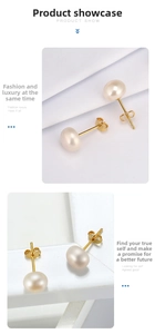 Detailed macro view of S925 silver stud earrings with round natural freshwater pearls