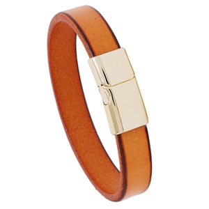 Minimalist orange brown leather bracelet with gold magnetic clasp on white background