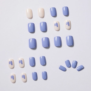 Lavender and cream press-on nail set with blue abstract graffiti art design