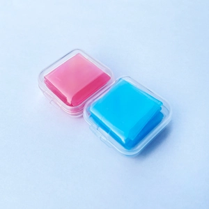 Diamond painting wax organizer set with pink and blue drill mud in clear plastic boxes