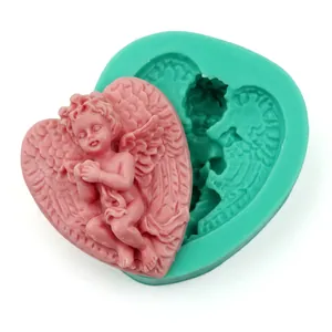 Detailed cupid angel silicone mold with pink heart-shaped finished soap on white background