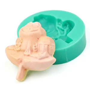 Detail of rose silicone mold and completed fondant crafts for DIY cake decorating