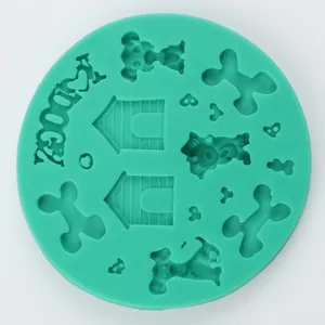 Top view of a round green silicone mold with various dog-themed bone and paw designs