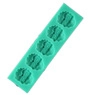 Detail view of green silicone mold featuring five flower-shaped cavities for DIY baking
