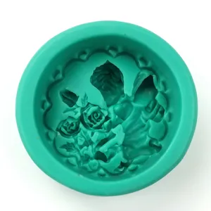 Detailed macro view of a green silicone mold featuring a blooming rose flower pattern