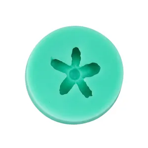 Macro view of mint green silicone flower mold for DIY fondant cake and resin crafting