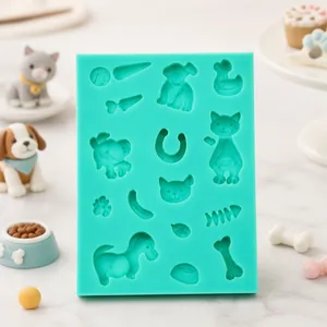 Green silicone mold featuring cat, dog, duck, and carrot shapes for fondant DIY baking