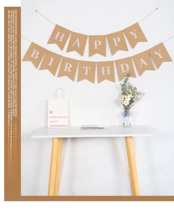 Detail of vintage kraft paper fishtail Happy Birthday banner for party wall decoration