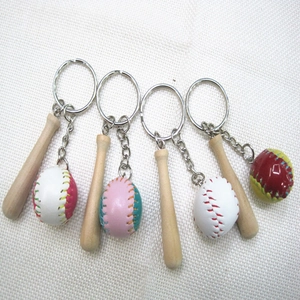 Mini wooden baseball bat and glove keychain charms in four assorted vibrant sport colors
