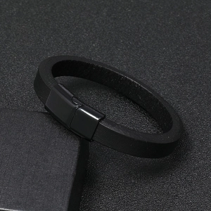 Macro detail of high-quality black leather bracelet with sleek magnetic alloy clasp