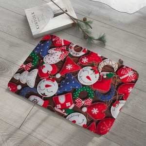 Detailed top view of Christmas flannel mat with patchwork snowman and star patterns