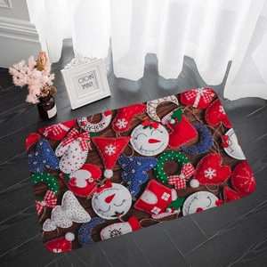 Detailed top view of Christmas flannel doormat featuring snowmen and holiday patterns