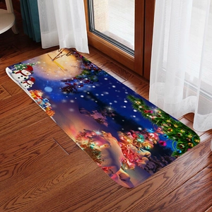 Detail of Christmas flannel rug with snowman and gift patterns on dark wood floor