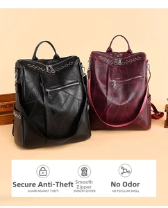 Dettagli di zaini in pelle nera e bordeaux con rivetti metallici e chiusure lampo