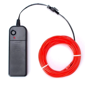 Detail view of red EL wire connected to a black battery controller for neon decoration