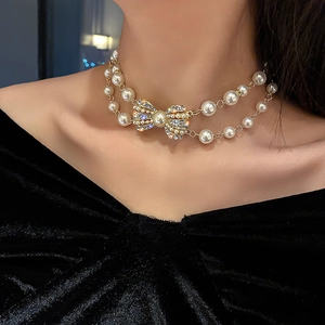 Collana di perle a doppio strato con ciondolo a fiocco di cristalli per donna