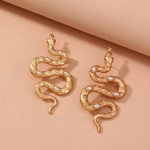 Vintage gold snake earrings with white pearl inlay and engraved grid pattern details