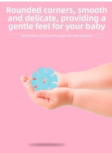 Close-up of a blue snowflake block with rounded edges held by child hands for safety