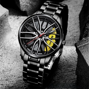 Macro shot of black steel watch featuring racing wheel hub dial and yellow brake caliper