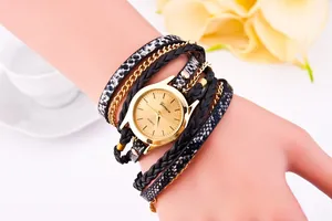 Detail of Geneva quartz watch with leopard print leather wrap and gold chain on wrist