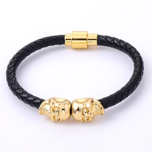 Men's punk braided cowhide leather bracelet with golden skull charms and magnetic clasp
