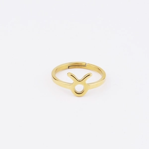Detailed macro of a 18k gold-plated stainless steel Taurus zodiac sign adjustable ring