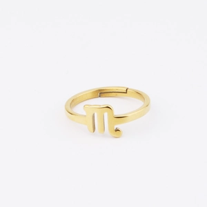 Detail of 18k gold Scorpio zodiac sign open ring with polished mirror stainless steel finish