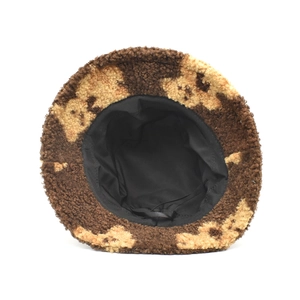 Internal detail of warm fleece bucket hat showing black lining and adjustable drawstring