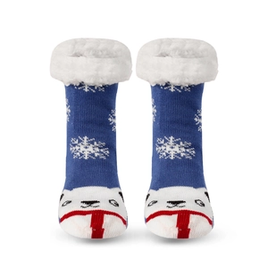 Detailed knit texture of blue Christmas polar bear socks with white plush cuffs