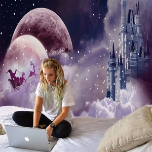 Detail of purple fantasy castle tapestry with Santa's sleigh over a moonlit starry sky