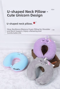 Detail of cartoon unicorn U-shaped neck pillows with memory foam and embroidery