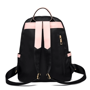 Waterproof black nylon backpack for women with pink straps and gold zipper back view