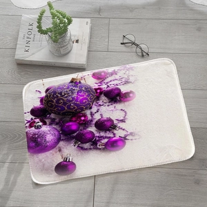 Absorbent flannel Christmas doormat with purple ornaments on light wood flooring