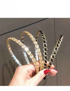 Detail view of a 4-piece set of elegant metal chain and crystal headbands for women