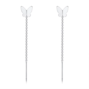 Macro detail of S925 sterling silver butterfly tassel threader earrings with fine chains